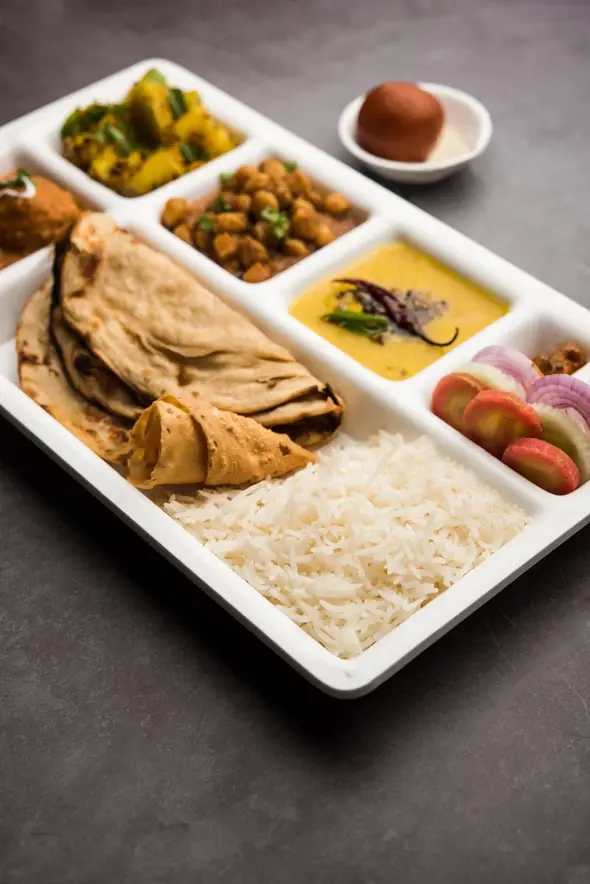 Veg and Non-veg lunch platter image